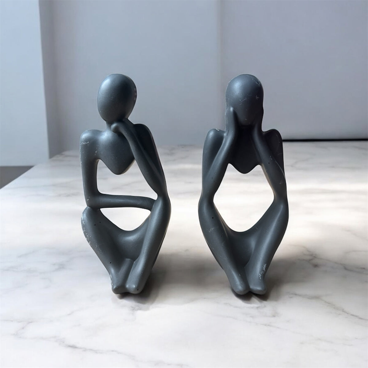 Statues "penseur" et "rêveur"