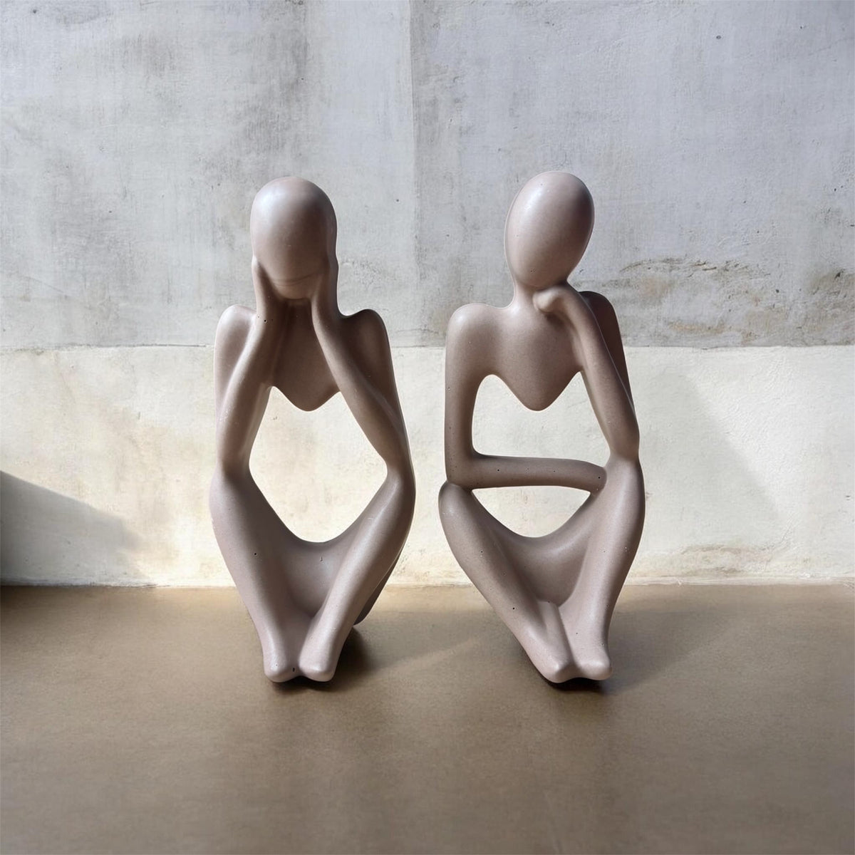 Statues "penseur" et "rêveur"